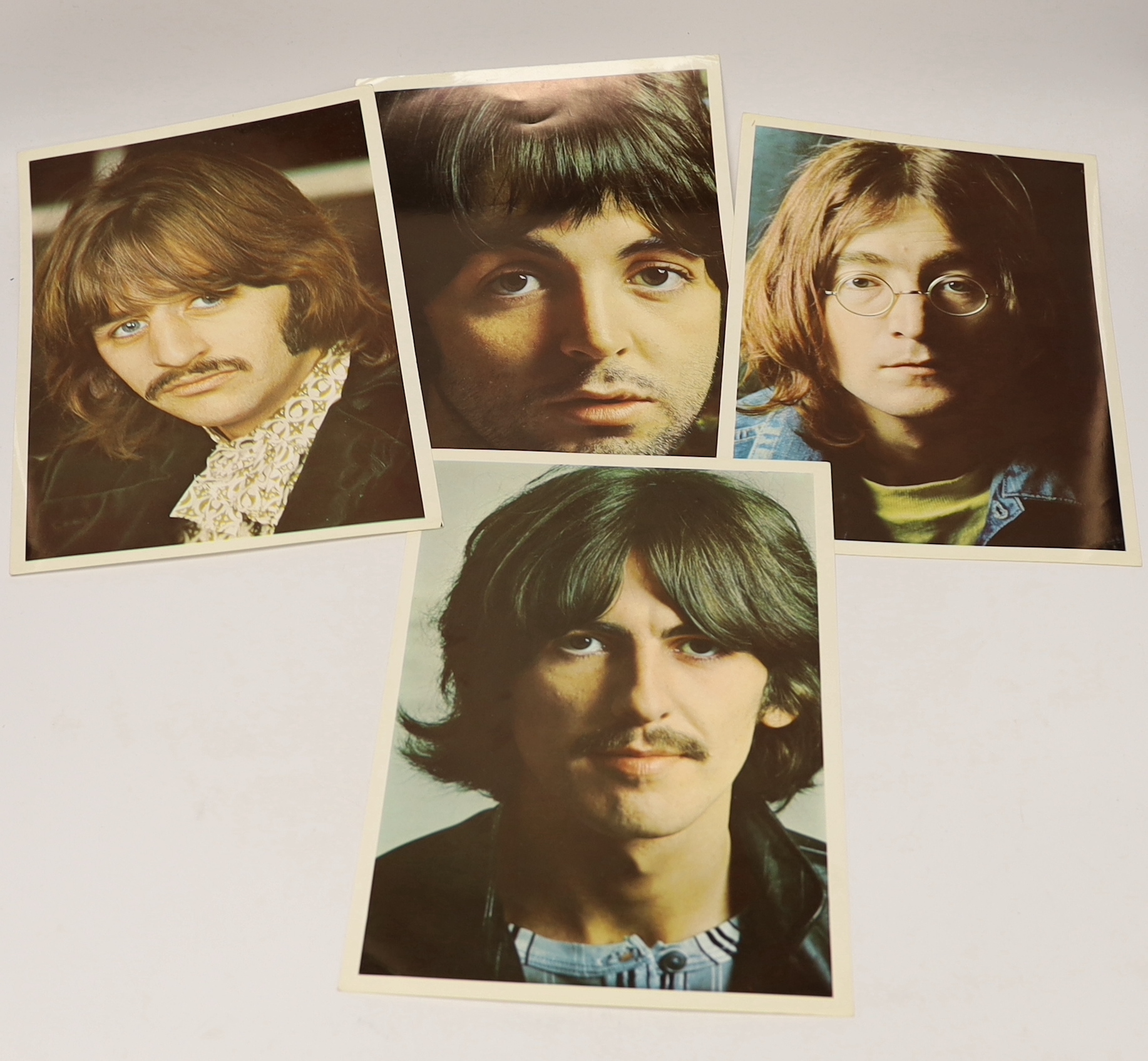 The Beatles; The White Album, top opening cover numbered 0557785, two LPs with set of four photographs and booklet, missing inner sleeves